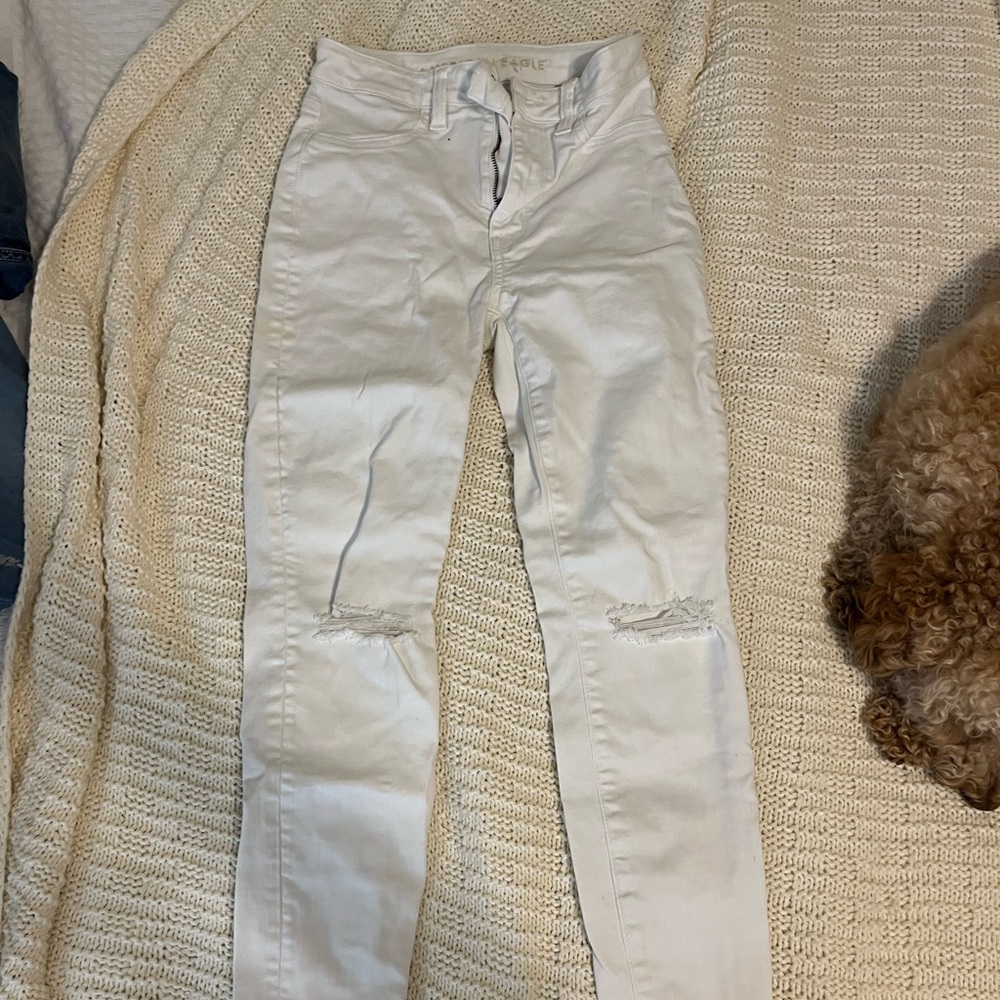 White American eagle jeans with knee rips